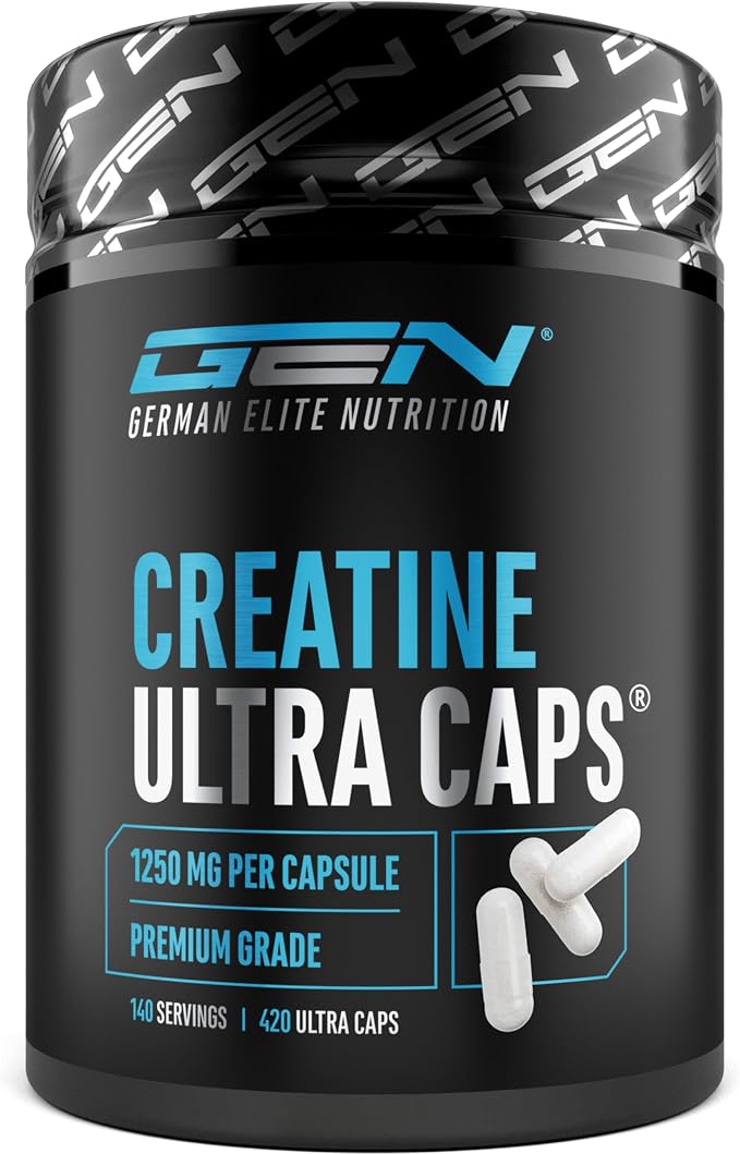 Un pot noir de créatine en gélules de la marque GEN German Elite Nutrition, avec l'inscription 'CREATINE ULTRA CAPS'. On peut lire '1250 MG PER CAPSULE' et '420 ULTRA CAPS'. Quelques gélules blanches sont visibles à côté du pot.