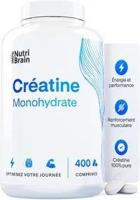 Description visuelle de la bouteille de créatine monohydrate Nutri Brain de 400 comprimés, avec des comprimés blancs visibles à côté.
