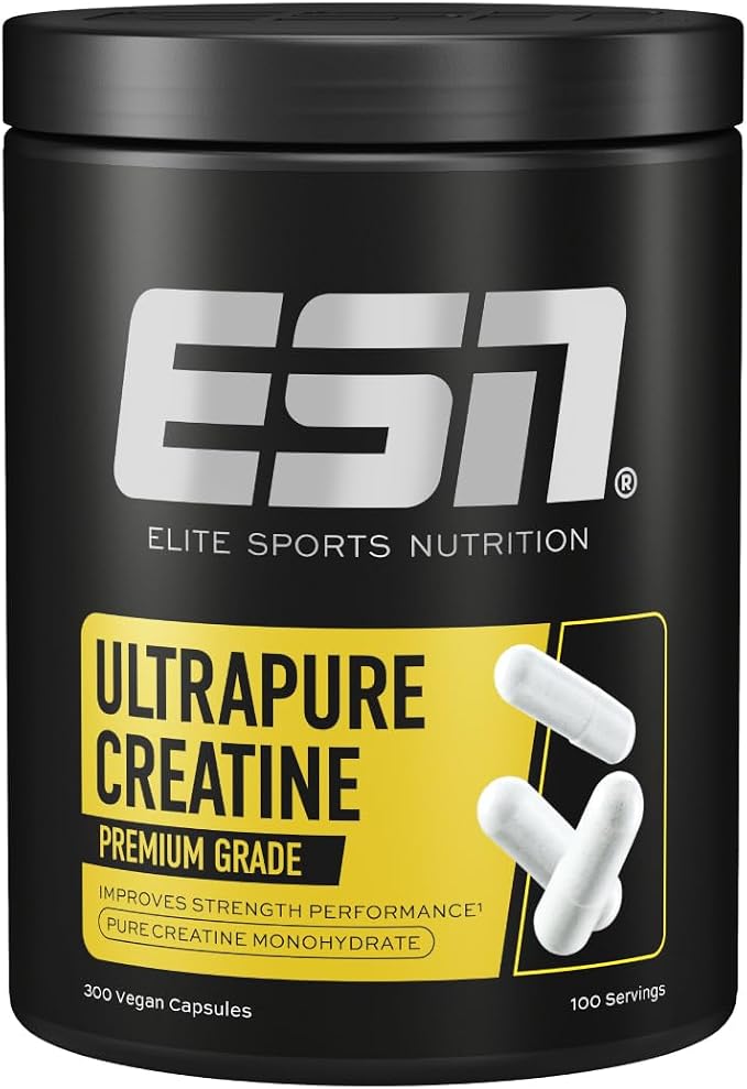 Pot noir de créatine ESN Creatine Giga Caps avec l'étiquette jaune et blanche indiquant 'ULTRAPURE CREATINE PREMIUM GRADE', '300 vegan capsules' et '100 Servings'. Trois gélules blanches sont représentées sur l'étiquette.