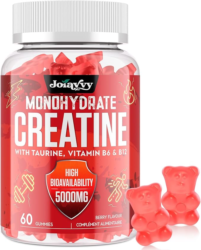 Bouteille de créatine Joiavvy en gummies, de couleur rouge, avec deux gommes en forme d'oursons à côté. L'étiquette indique 'Créatine Monohydrate avec Taurine, Vitamine B6 & B12' et '5000mg'.